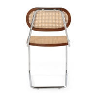 Lucio Chair in natural rattan with a cantilever base
