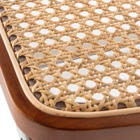 Cadeira Lucio em rattan natural com base em balancim