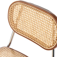 Lucio Chair in natural rattan with a cantilever base