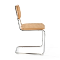 Lucio Chair in natural rattan with a cantilever base