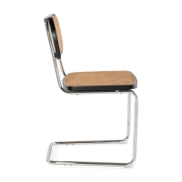 Lucio Chair in natural rattan with a cantilever base
