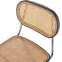 Lucio Chair in natural rattan with a cantilever base