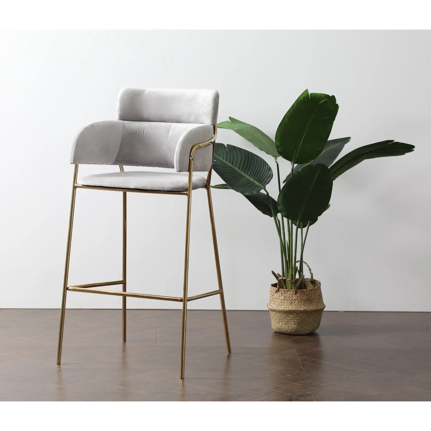 Tabouret haut rembourré avec pieds dorés