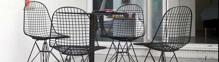 Replica of industrial style metal Eames chairs