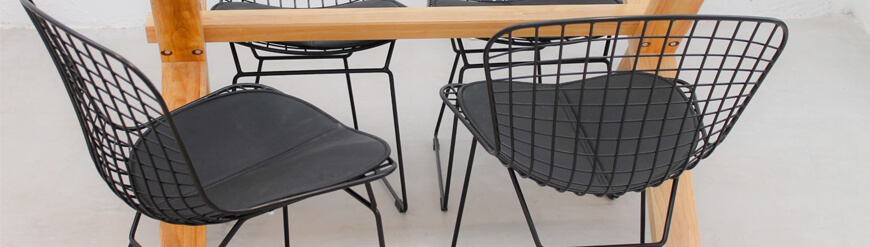Collection of Bertoia chairs and stools